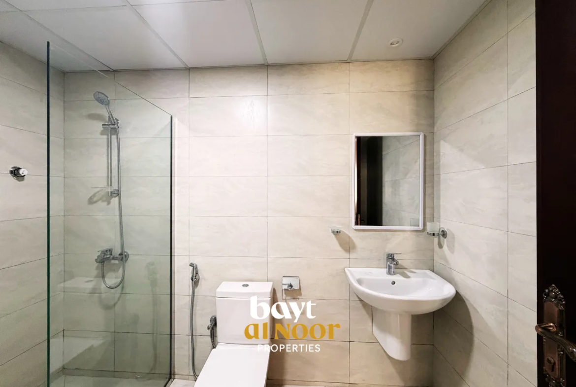 For Rent: Spacious 2-Bedroom Flat with Private Parking in Qurum | REF KT5027